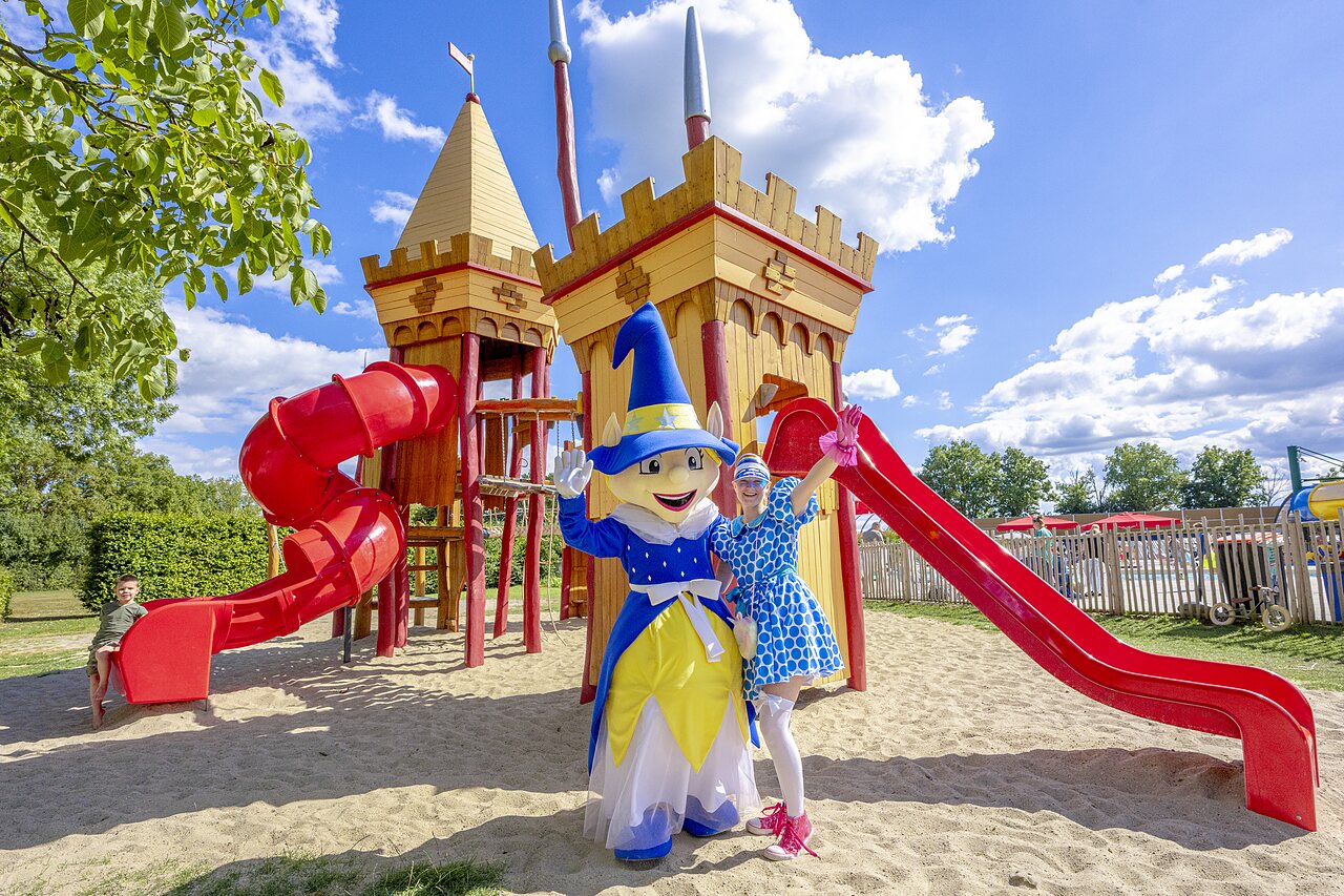 Castle playground, red slides and mascots at CAPFUN IJsselstrand campsite in Doesburg.