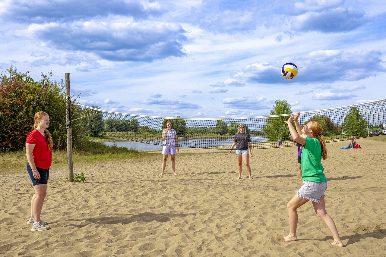Beach volleyball on the sand at CAPFUN IJsselstrand campsite in Doesburg.