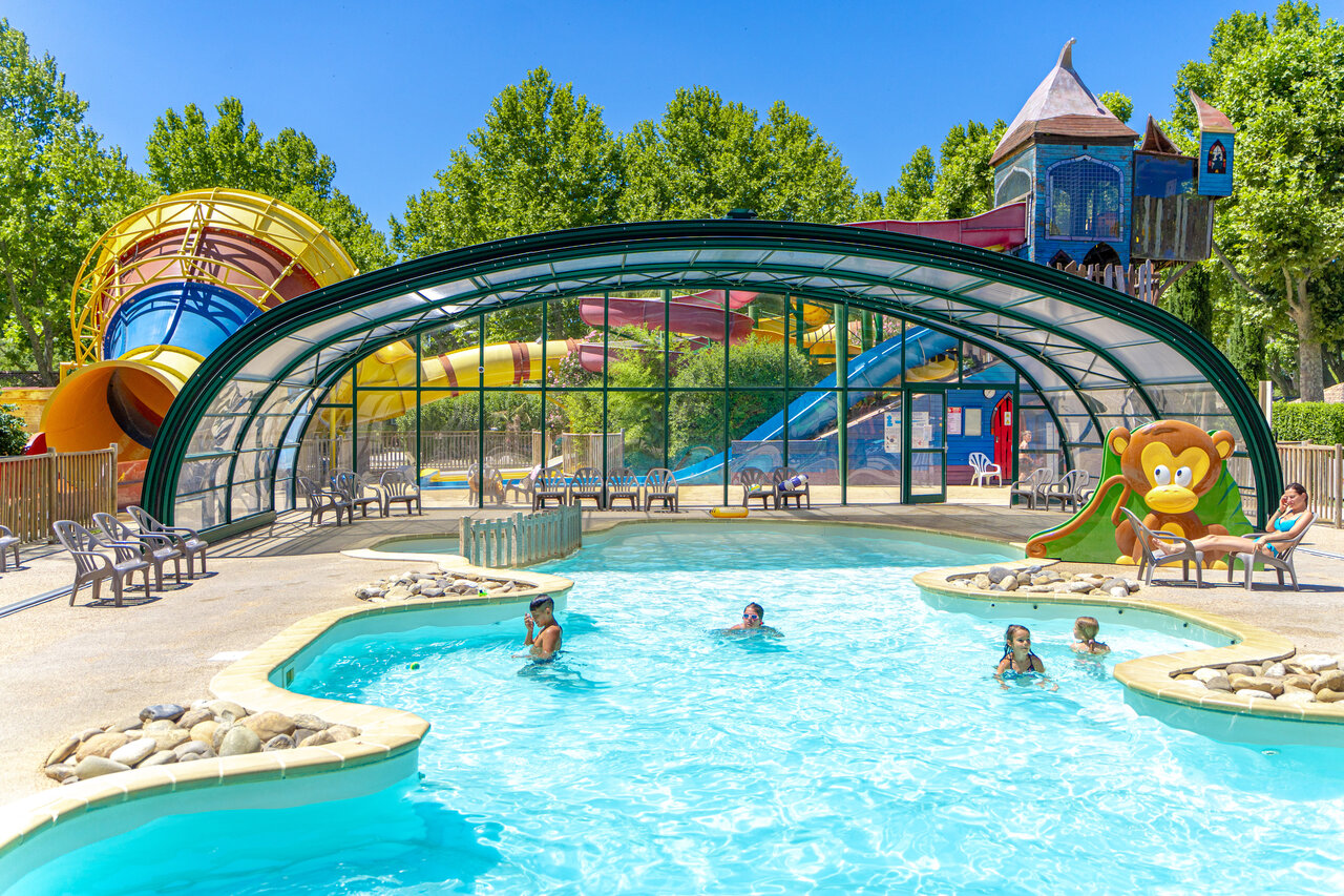 Swimming pool, water slides and games at CAPFUN Jantou campsite in LE THOR (84).