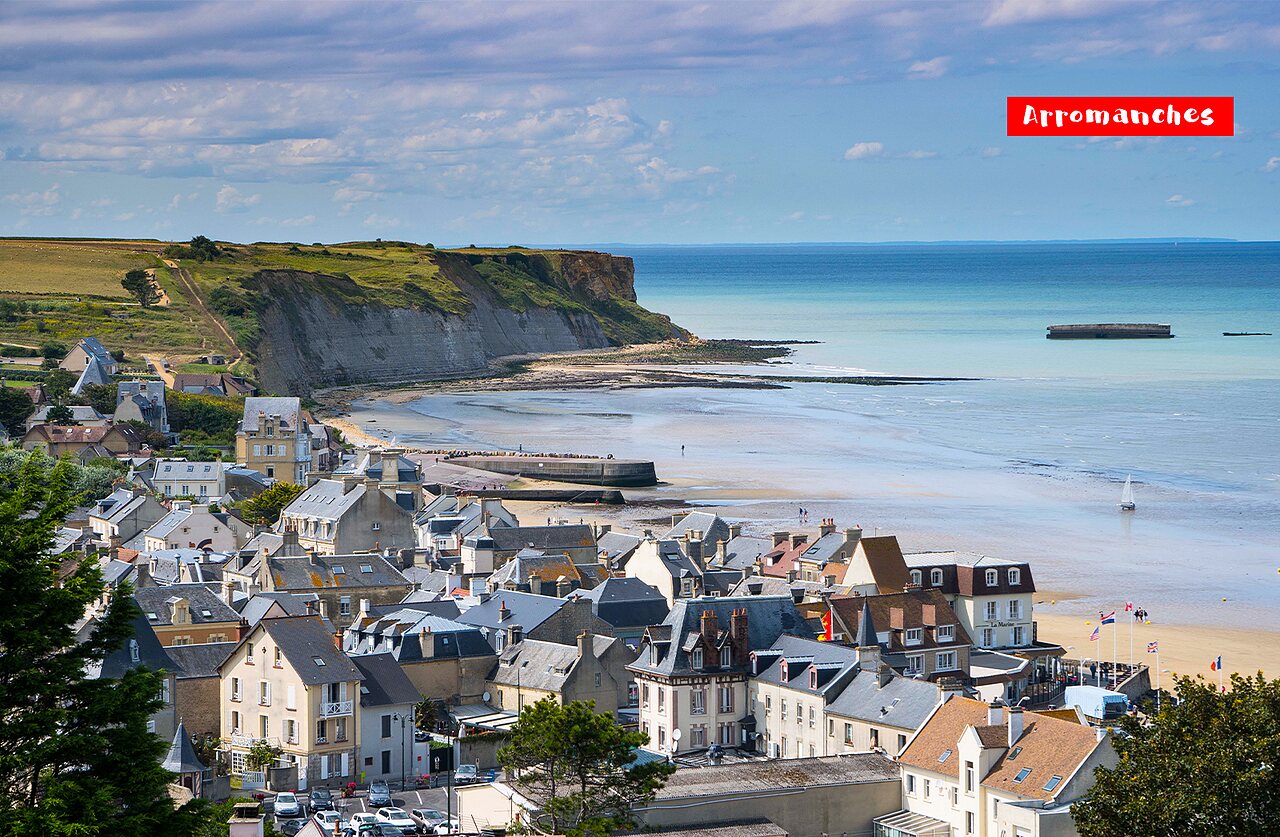 Arromanches-les-Bains, historic coastal town with beach and artificial harbour remains.