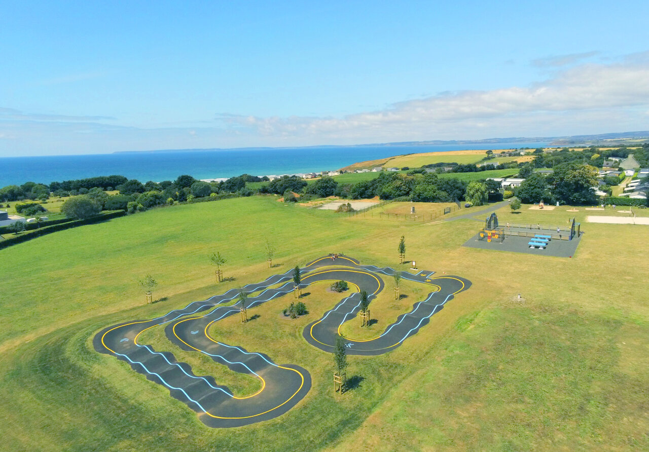 Pump track, playground and sea view at CAPFUN Kervel campsite in PLONEVEZ PORZAY (29).