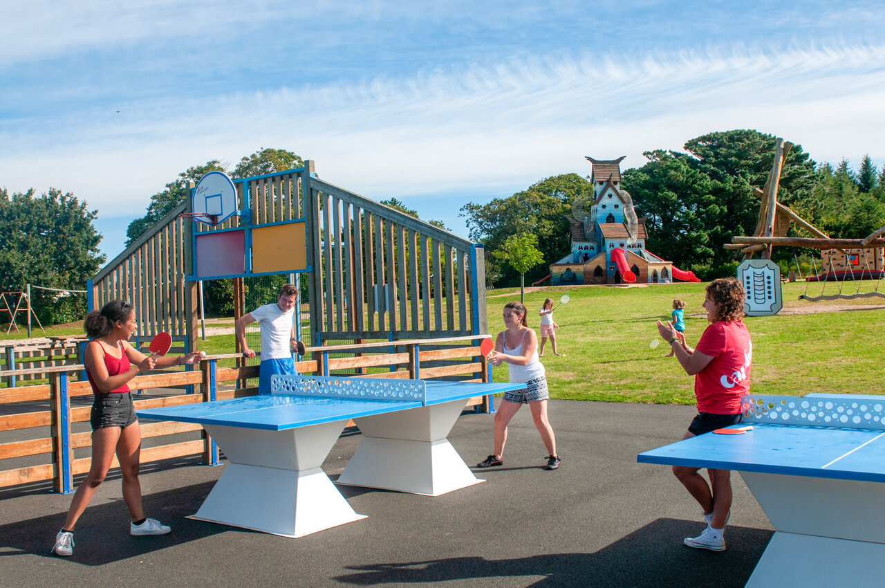 Table tennis tables and play area at CAPFUN Kervel campsite in PLONEVEZ PORZAY.