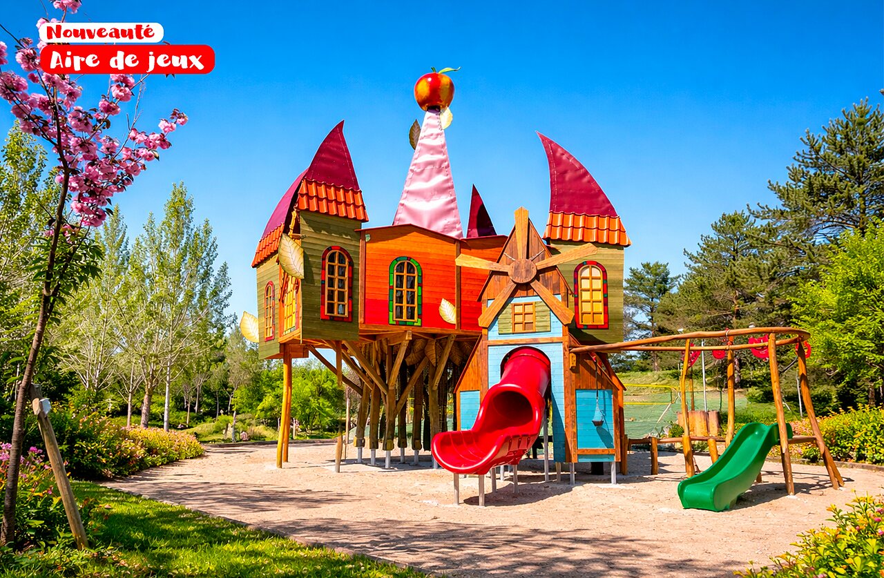 Themed playground, red slide, camping CAPFUN Lac des 3 Vall�es Lectoure.