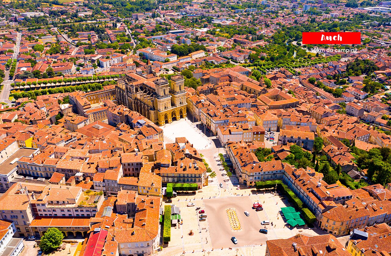 Sainte-Marie Cathedral of Auch and historic city center from the sky, Gers, Occitanie.