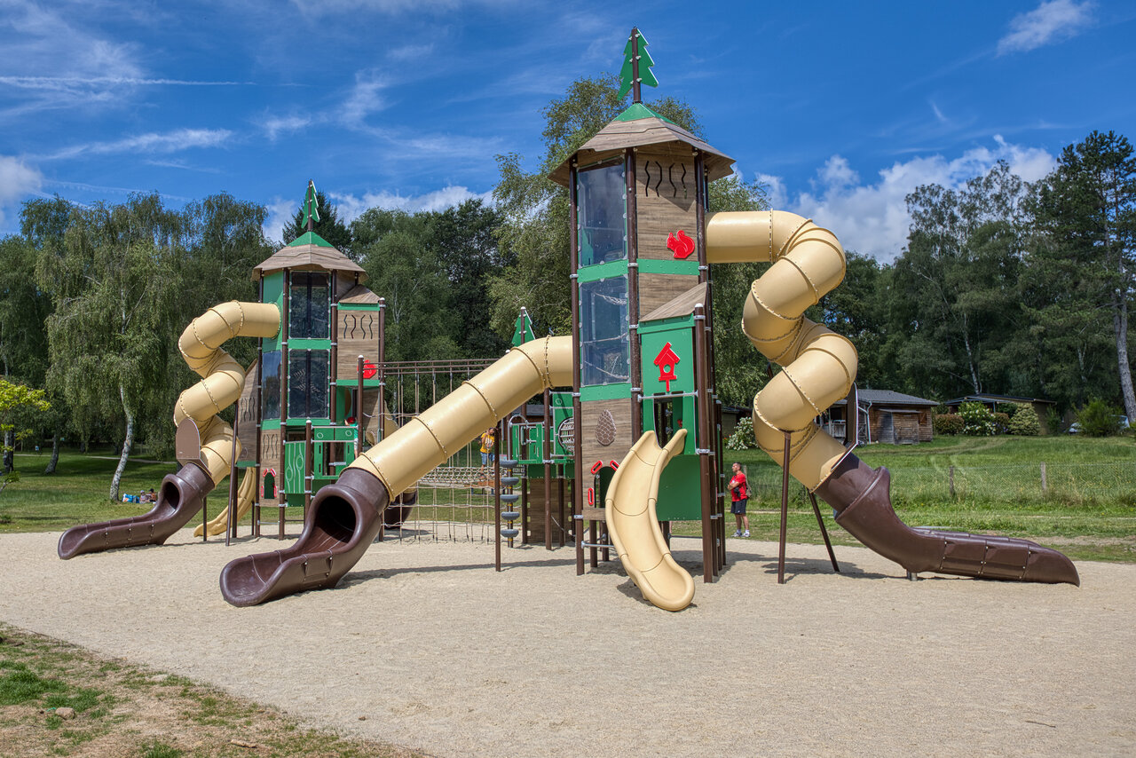 Playground with slides at CLICOCHIC Lac de Miel, Beynat (19).