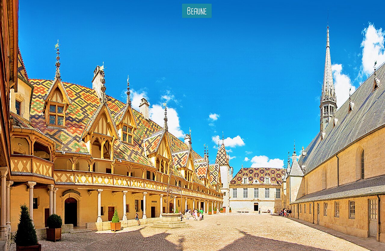 Hospices de Beaune, historic monument with colorful roofs, to visit in Burgundy.