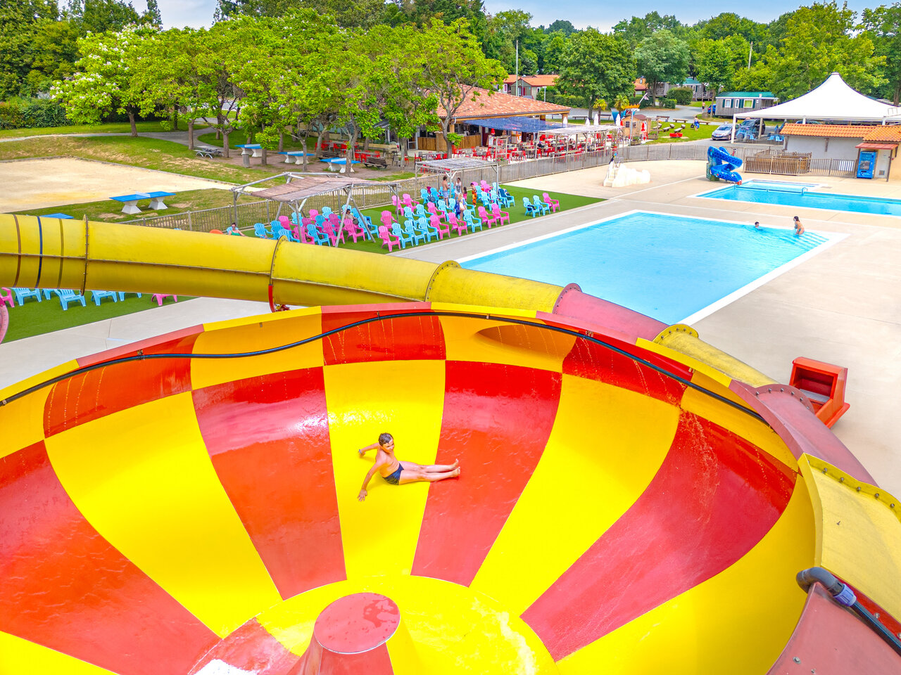 Giant water slide, outdoor swimming pool at CAPFUN Lac de Ribou, Cholet (49).