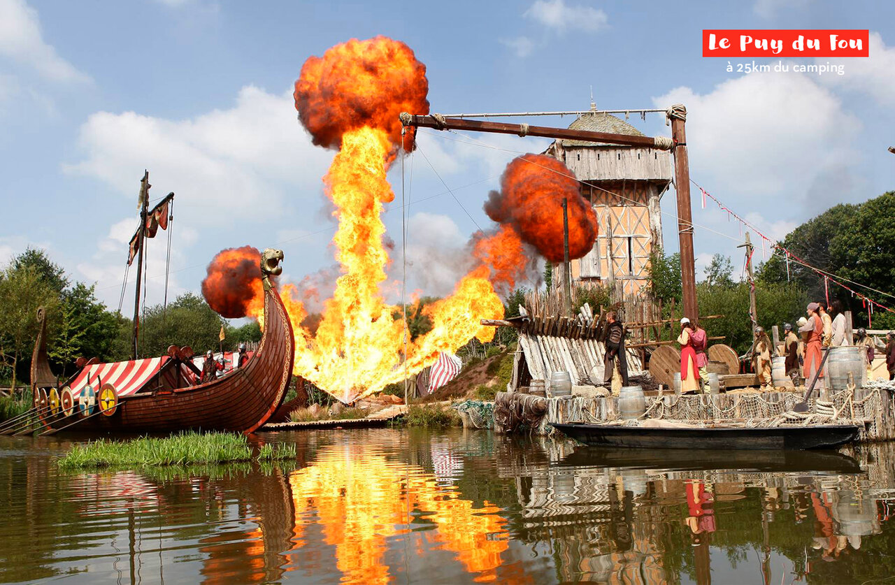 Historical show with Viking longship and explosions at Puy du Fou, Vend�e.