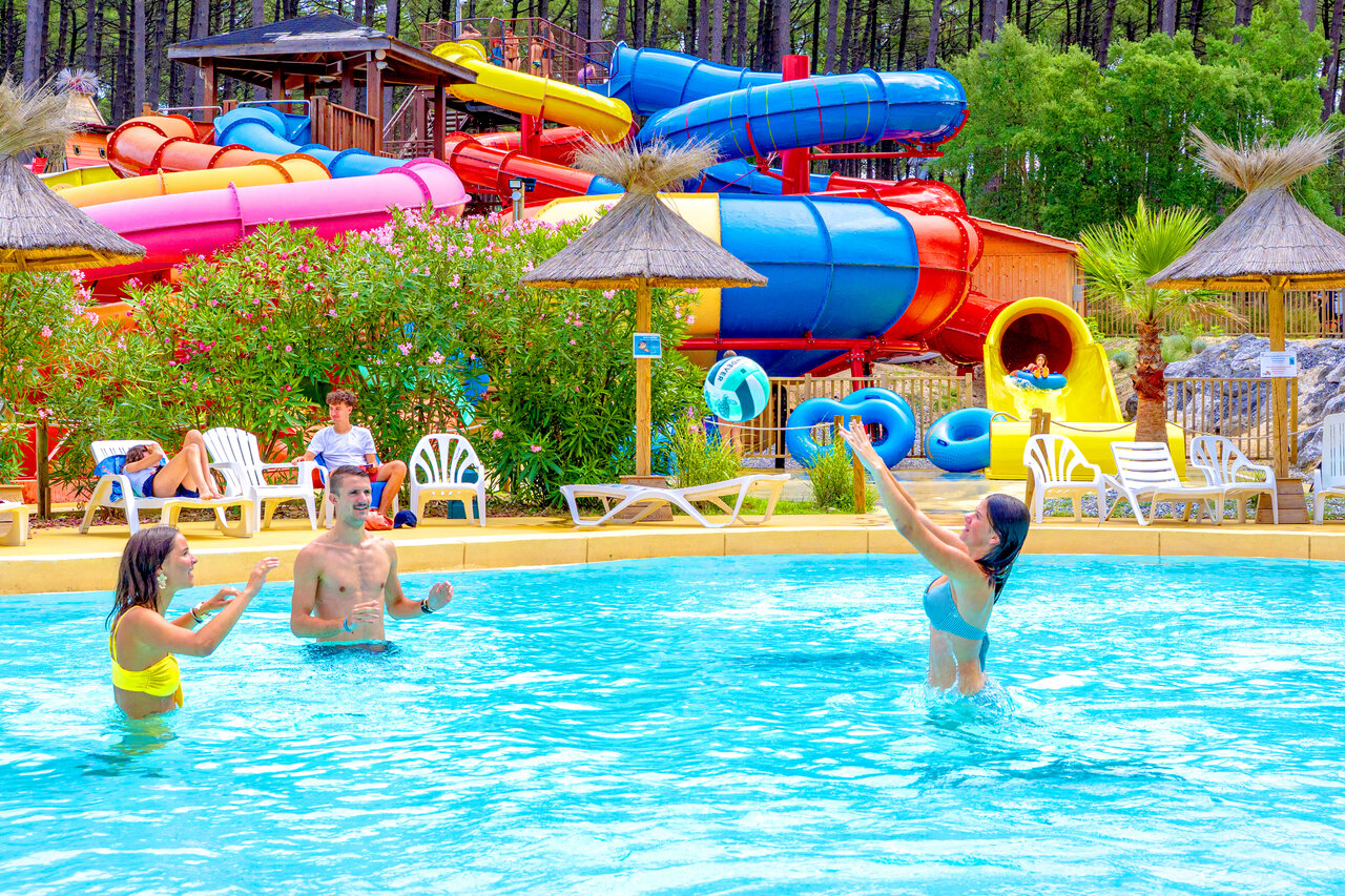 Outdoor pool and colorful water slides at CAPFUN Landisland in Moliets-et-Maa.