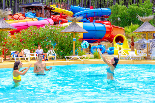Outdoor pool and colorful water slides at CAPFUN Landisland in Moliets-et-Maa.