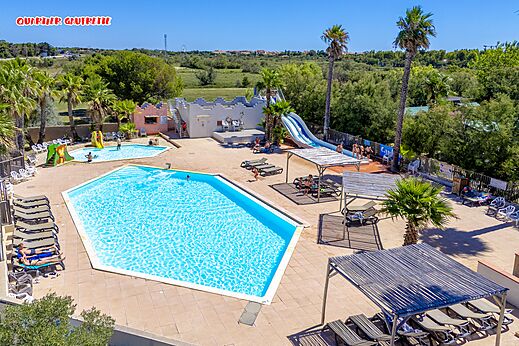 Pool, waterslide and children's paddling pool at CAPFUN Las Bousigues campsite.