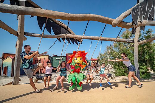 Large swing, children and mascot at CAPFUN Las Bousigues campsite in Le Barcar�s (66).