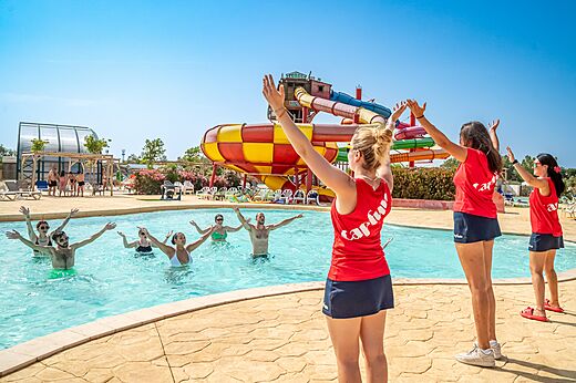 Aqua aerobics and giant water slides at the pool of CAPFUN Las Bousigues campsite in Le Barcar�s (66).