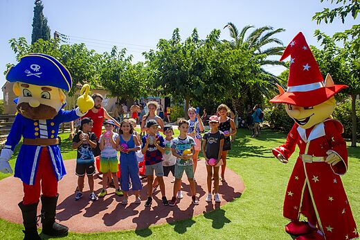 Mascots and children playing with balls at CAPFUN Las Bousigues campsite in Le Barcar�s (66).