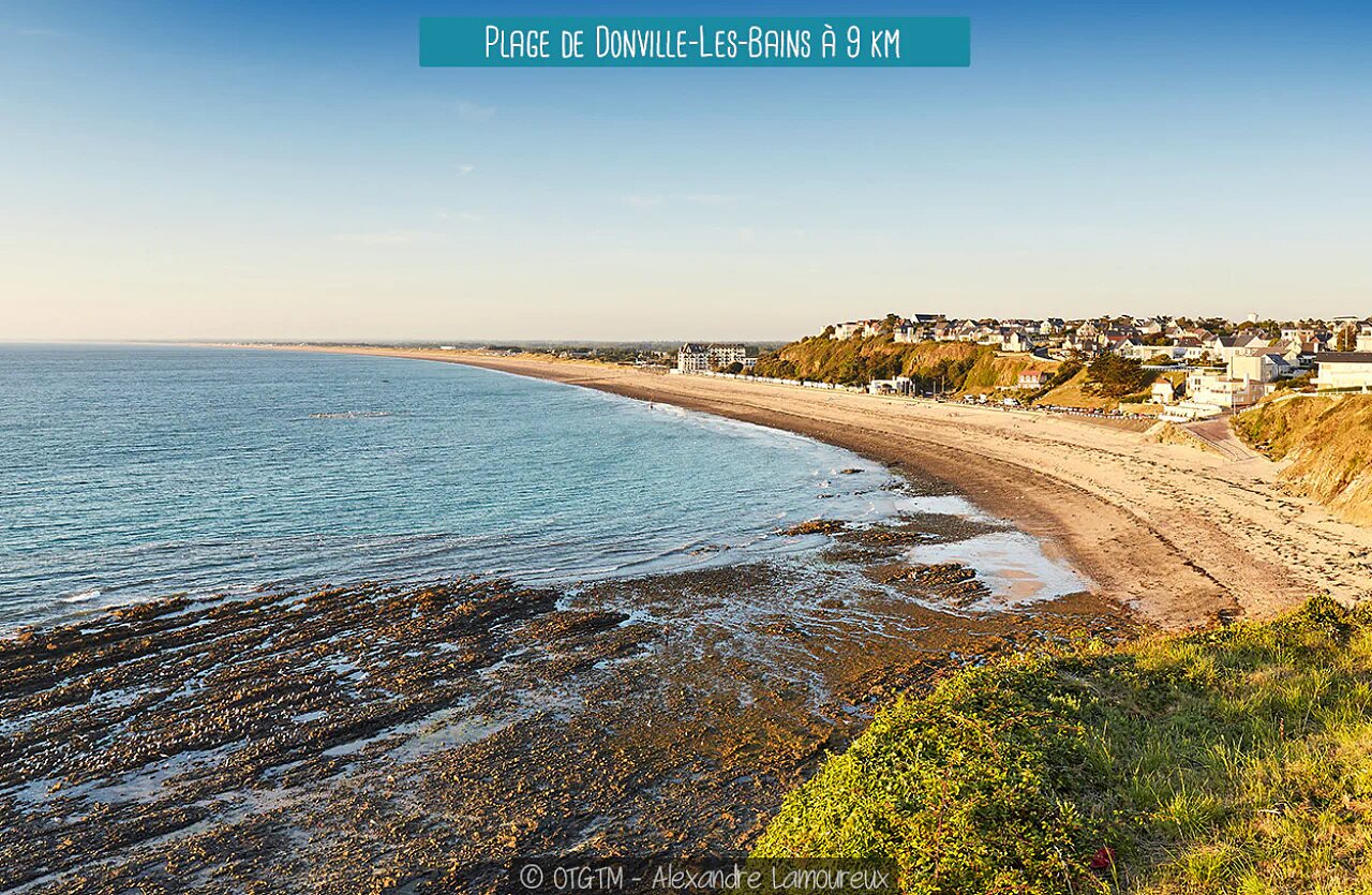 Donville-les-Bains beach, a long sandy coastline near Granville, Normandy.