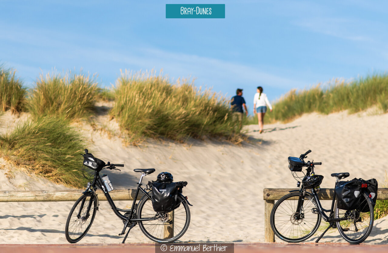 Bicycles parked on the beach promenade of Bray-Dunes, a place to visit.