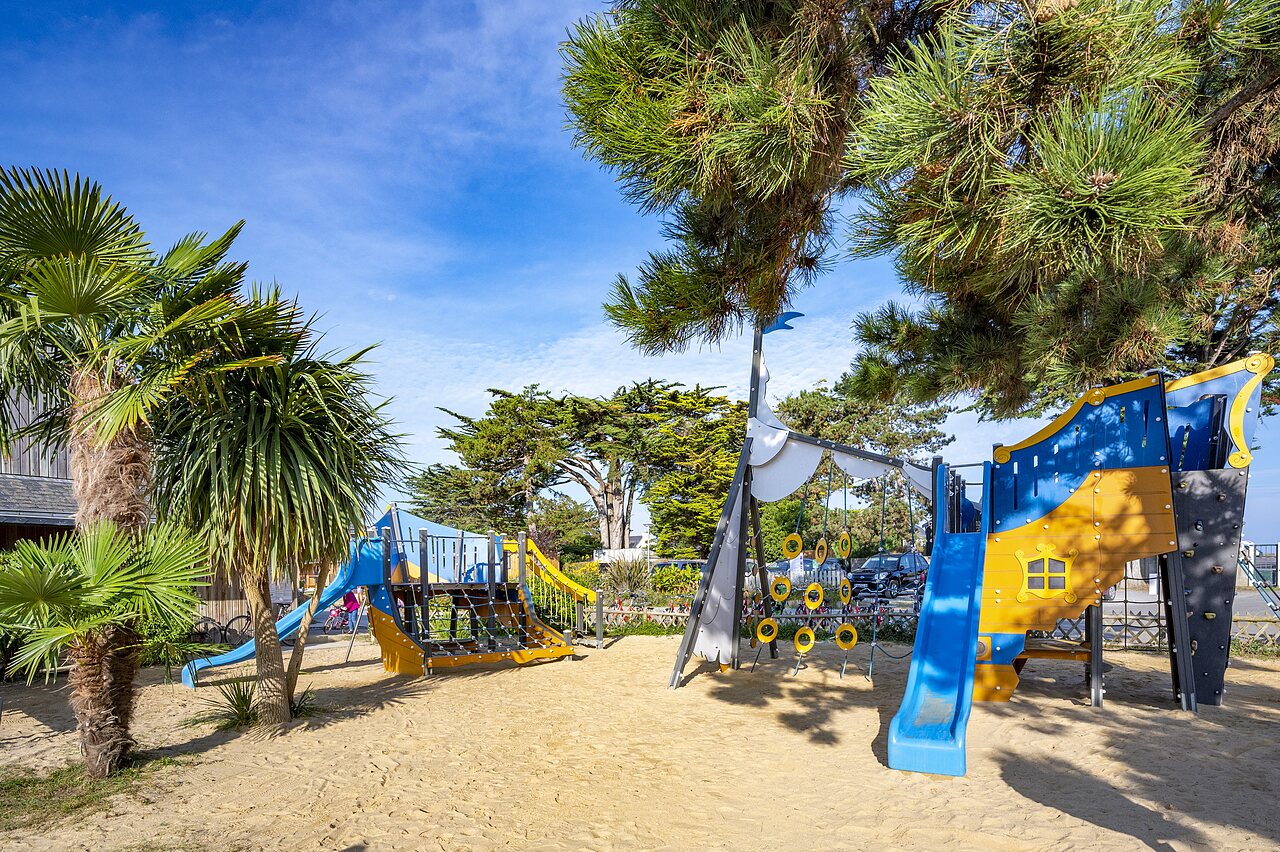 Pirate ship, slides, sand at CLICOCHIC Longchamp campsite in Saint Lunaire.