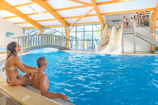 Indoor pool, water slides at CAPFUN Loubine campsite Les Sables d'Olonne.