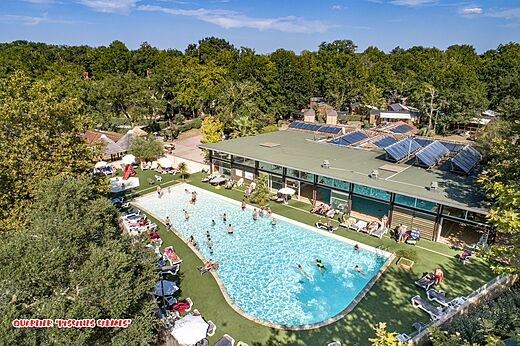 Outdoor swimming pool, aerial view at CAPFUN Lou Puntaou campsite in LEON (40).