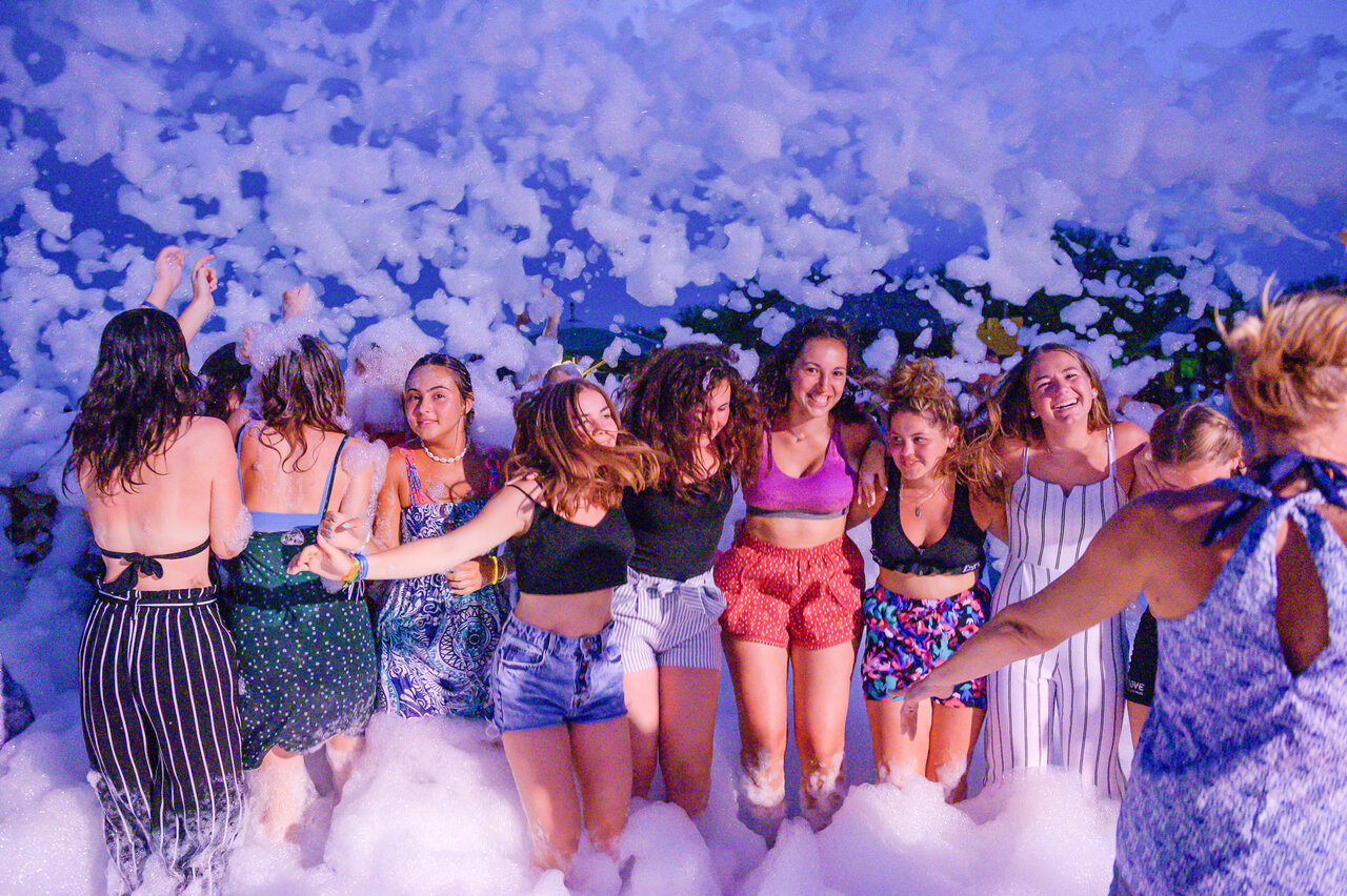 Young women enjoying foam party at CAPFUN Madrague campsite in PORNIC (44).
