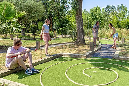 Outdoor family mini-golf at CAPFUN Mael campsite in ARGELES SUR MER (66).