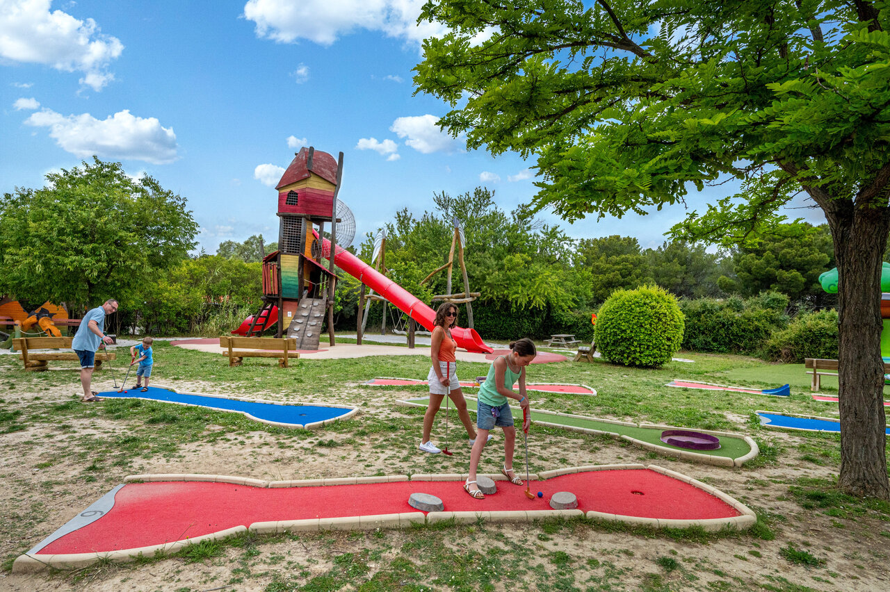 Mini-golf and large slide at CAPFUN Malissonne campsite in LA CADIERE D'AZUR.