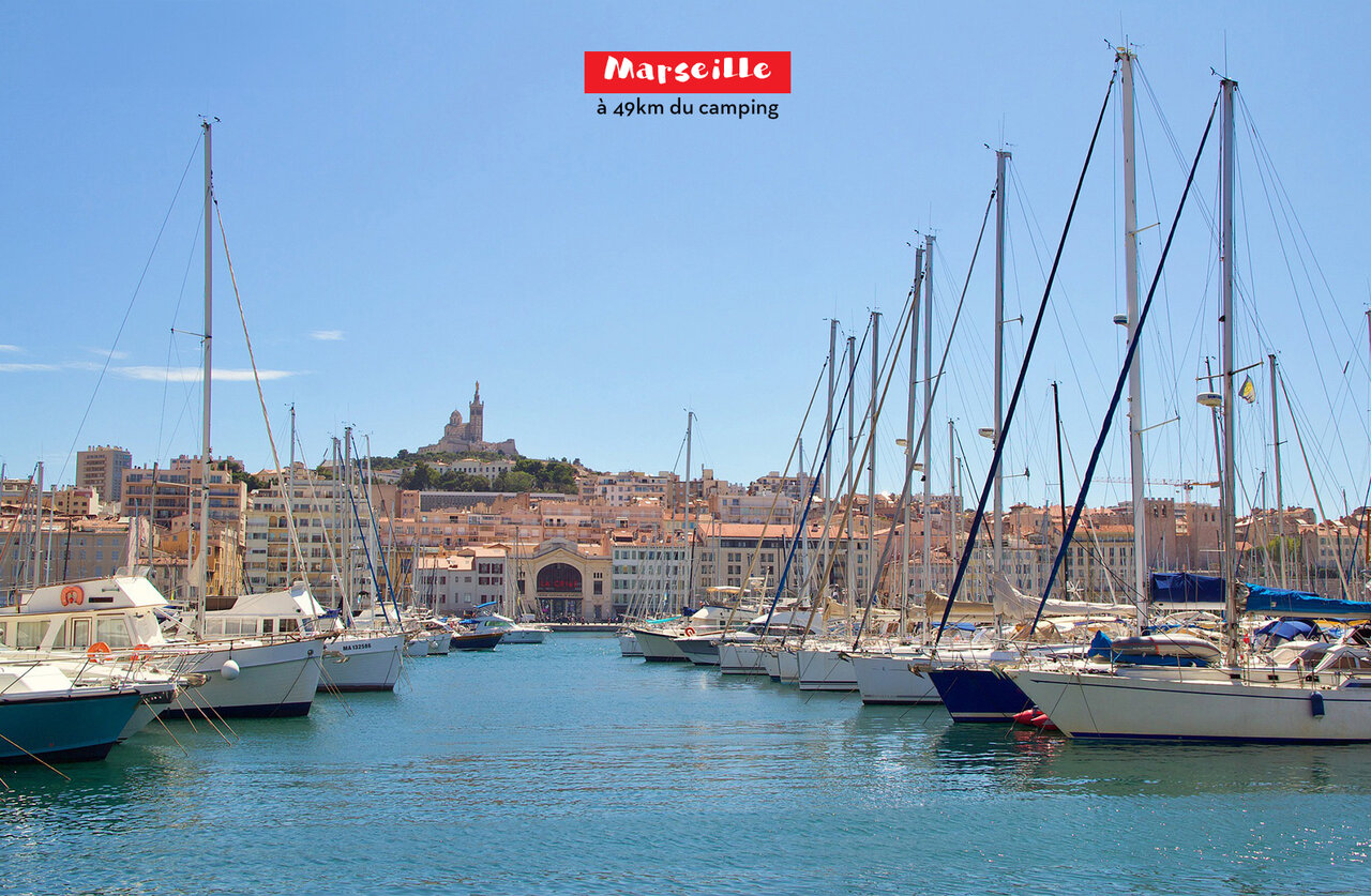 Old Port Marseille with Notre-Dame de la Garde, tourist spot in Provence.