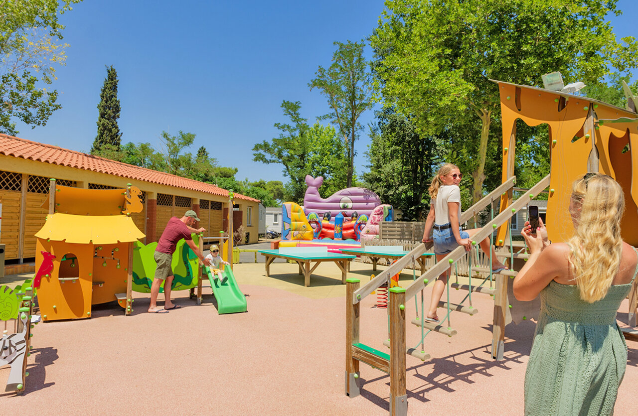 Playground, slides, bouncy castle at VAGUES OCEANES Marinette campsite in Ste Marie La Mer.