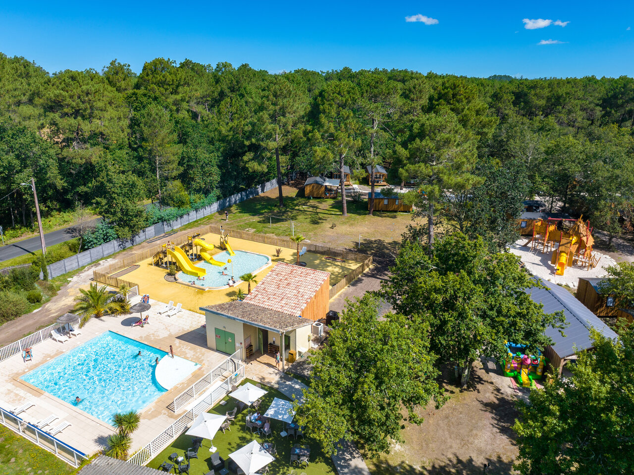 Aerial view water park, pools and slides at CLICOCHIC M�doc Bleu campsite in Carcans (33).