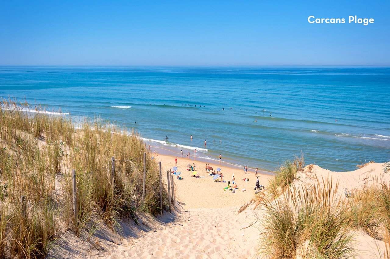 Carcans beach with dunes and ocean, a place to visit in Gironde.