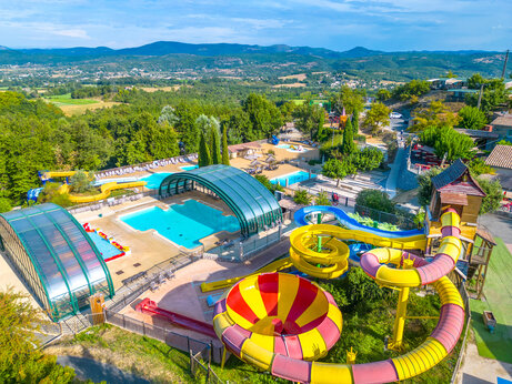 Giant water slides and indoor/outdoor pools at CAPFUN Merle Roux in Baix (07).