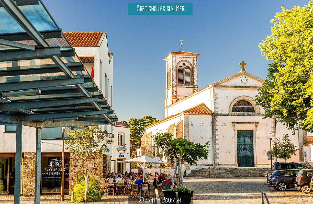 Saint-Nicolas church square with lively terraces in Br�tignolles-sur-Mer, Vend�e.