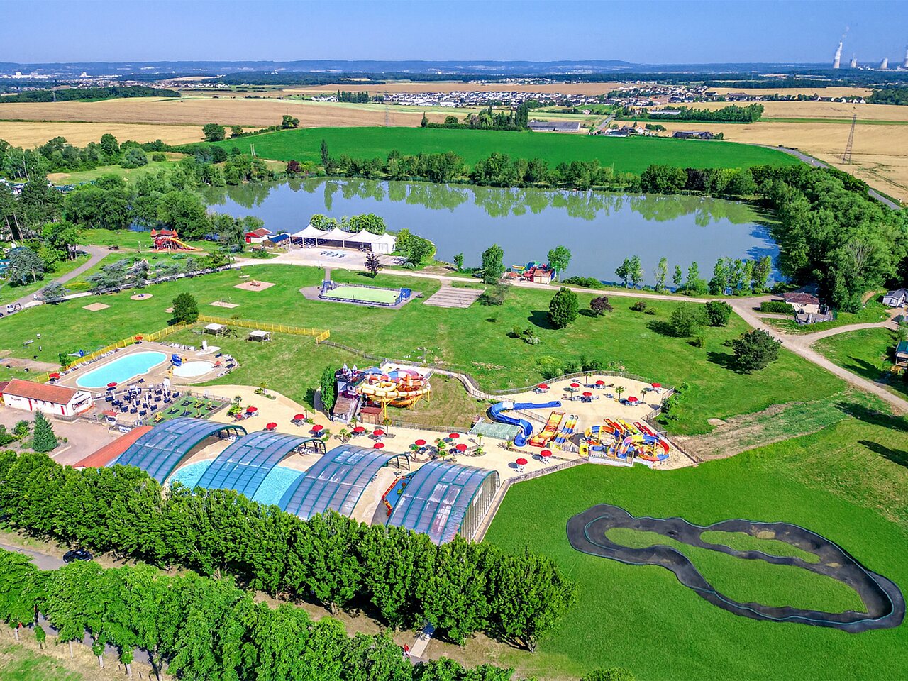 Aerial view water park, pools at CAPFUN Mirabelle campsite in VOLSTROFF.