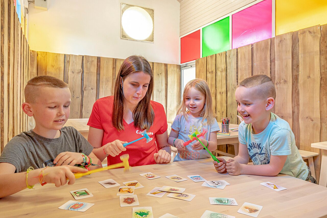 Board game, children and animator at CAPFUN Mirabelle campsite in VOLSTROFF.