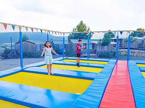 Giant trampolines for children and teenagers at CAPFUN Montblanc Park campsite in Montblanc (43).