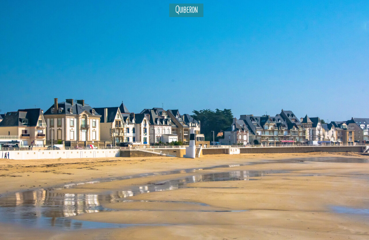 Fine sandy beach and typical houses of Quiberon, a town to visit.