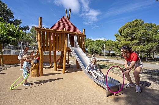 Wooden playground with slide for children at CAPFUN La Nautique Narbonne (11).