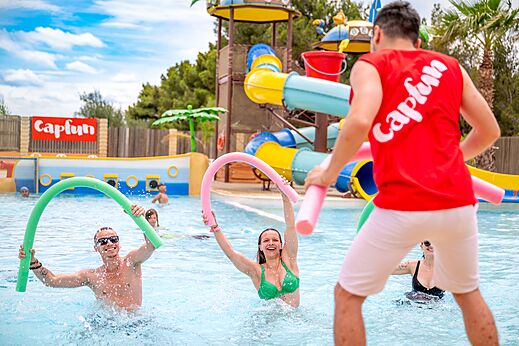 Lively water activity in pool with slides at CAPFUN La Nautique Narbonne (11).