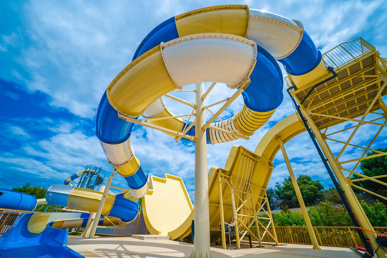 Giant blue and yellow water slides, CAPFUN La Nina in Agde (34).