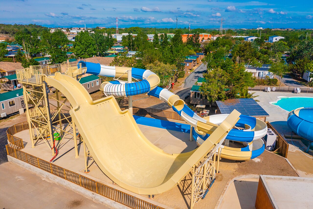 Giant water slides and swimming pool, aerial view of CAPFUN La Nina campsite in Agde (34).