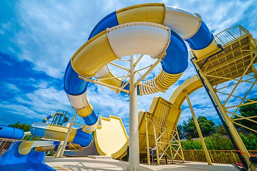 Giant colorful water slides at CAPFUN La Nina campsite in Agde (34).