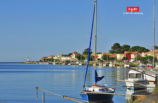 Agde port, boats, colorful houses, lighthouse, a must-visit near Agde (34).