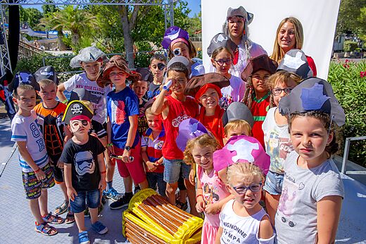 Children dressed as pirates with entertainers during an activity at CAPFUN La Nina campsite in Agde (34).
