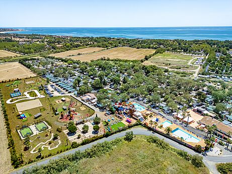 Aerial view campsite, pools, slides, playground CAPFUN Ondines Vias Plage (34).