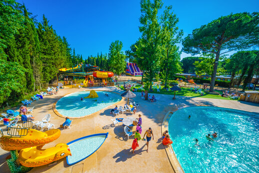 Outdoor pools, water slides and inflatable games at CAPFUN Or campsite in La Grande Motte (34).