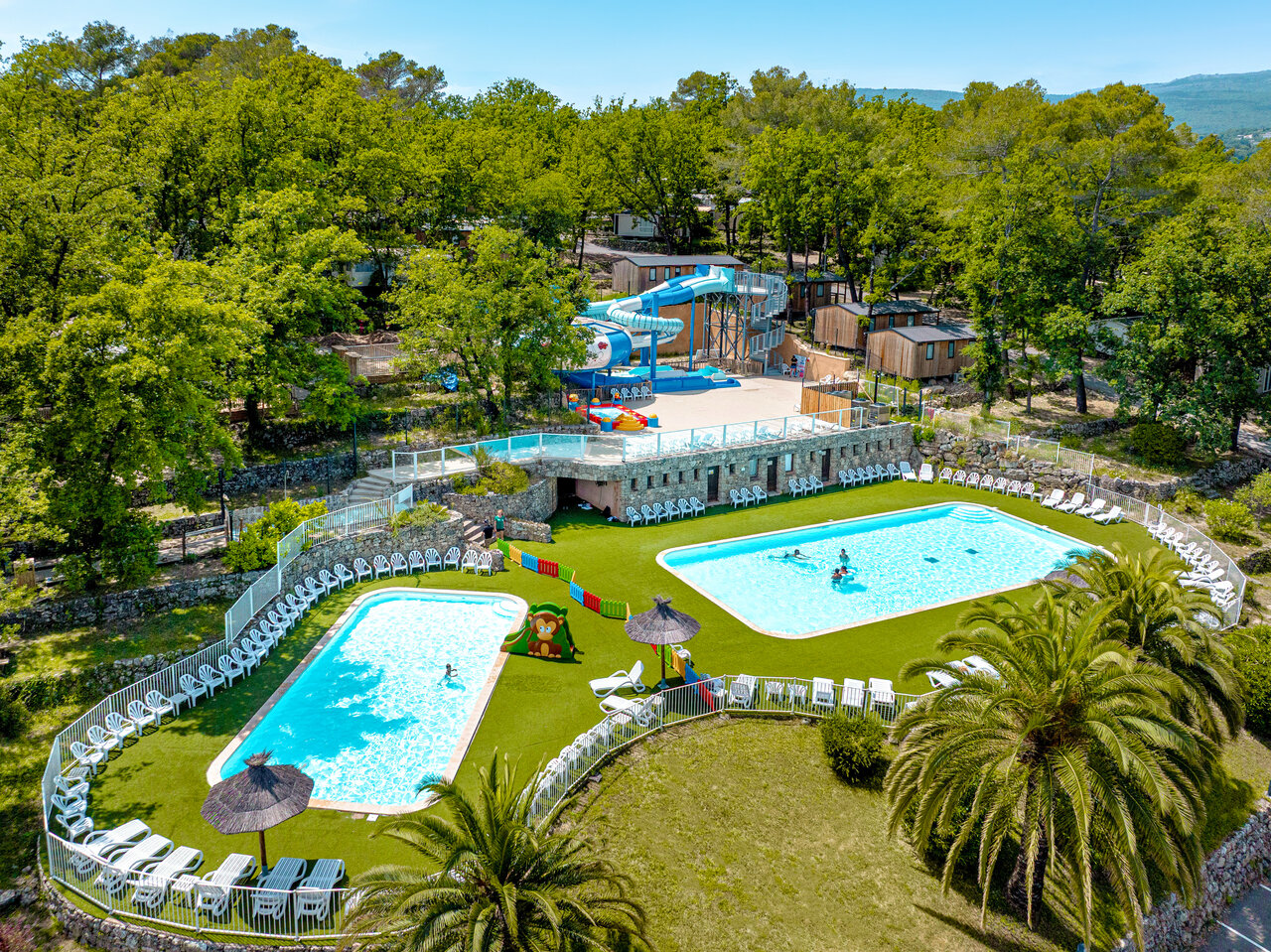 Outdoor pools, giant water slides at CLICOCHIC Or�e d'Azur campsite in OPIO (06).