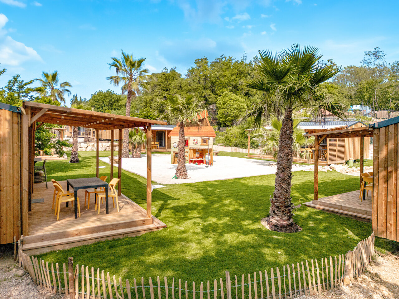 Mobile home, terrace, play area at CLICOCHIC Or�e d'Azur campsite in OPIO (06).