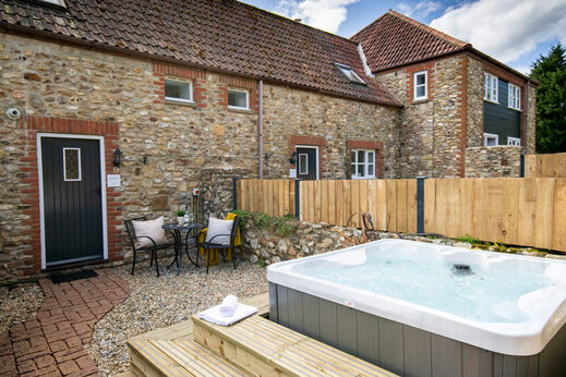 Private outdoor hot tub, accommodation CAPFUN UK Otter Falls in Upottery Nr Honiton.