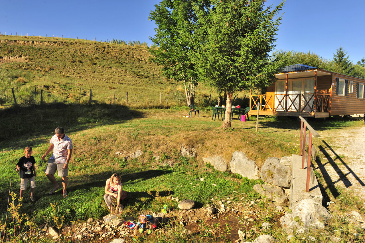 Mobil-home, family and stream at CAPFUN Oursi�re in Villard de Lans (38).