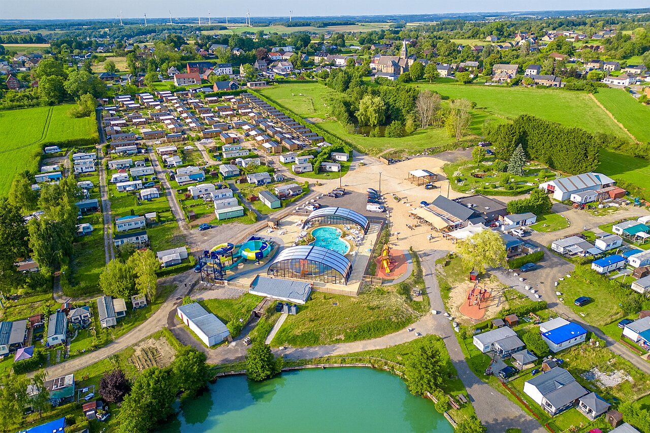 Aerial view of campsite with aquatic area, Mobil-homes at CAPFUN Pachy campsite in FOSSES LA VILLE.